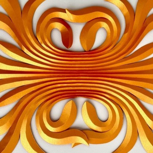 Gold coloured scrolling and curved paper