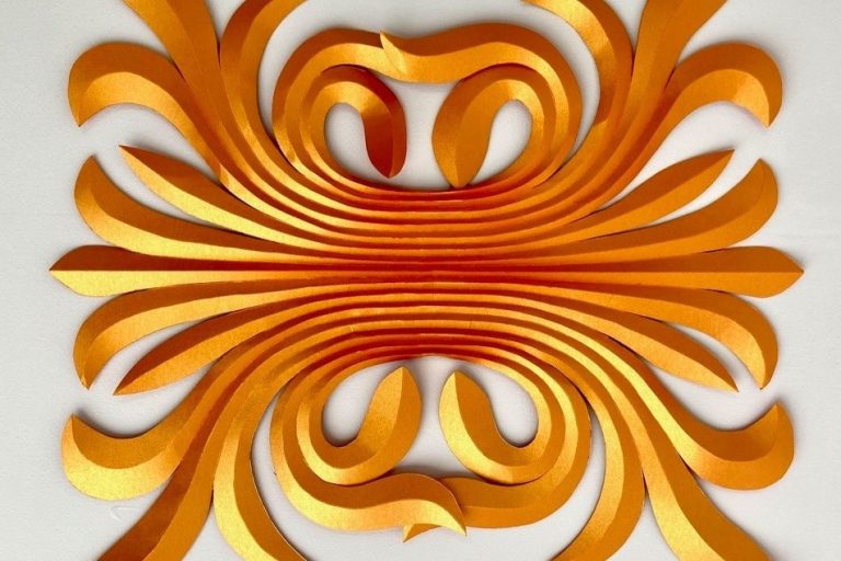 Gold coloured scrolling and curved paper